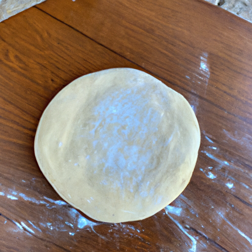 Homemade pizza dough ready to be used for making a Dutch Oven Supreme Pizza.